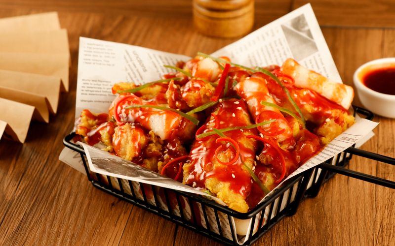 Crispy chicken wings with buffalo sauce