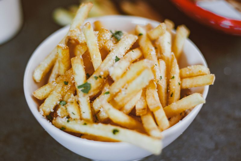 Crispy seasoned fries served hot